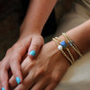 stacked bracelets showing how beautifully the Ashley bracelets look with other bracelet. Designed by Margie Edwards Jewelry