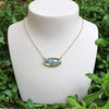 Oval Labradorite Necklace - Margie Edwards Jewelry Designs - show in 14kt gold-filled  on a jewelry head.